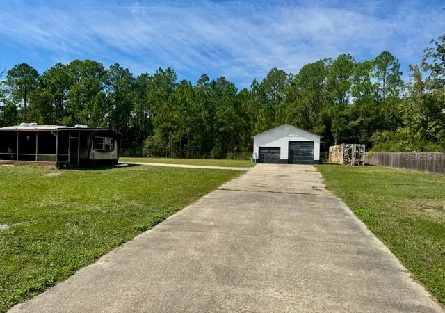 Photo 1 of Manufactured home for sale at 1542 Beech Blvd, Bunnell, FL 32110 | MLS# FC321822 | Listing updated on 2026-10-01