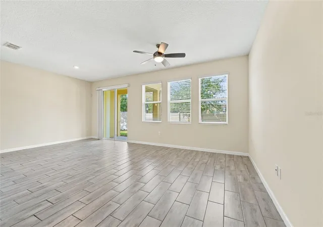 Photo 3 of Townhouse for sale at 302 Muscogee Ln, Orlando, FL 32825 | MLS# O6446377 | Listing updated on 2026-10-27
