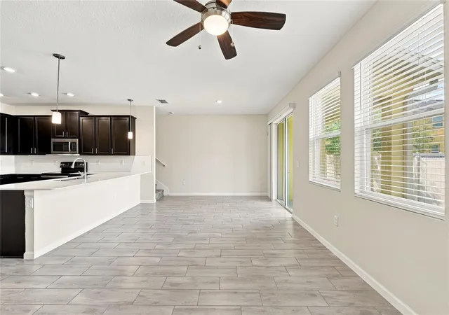 Photo 4 of Townhouse for sale at 302 Muscogee Ln, Orlando, FL 32825 | MLS# O6446377 | Listing updated on 2026-10-27