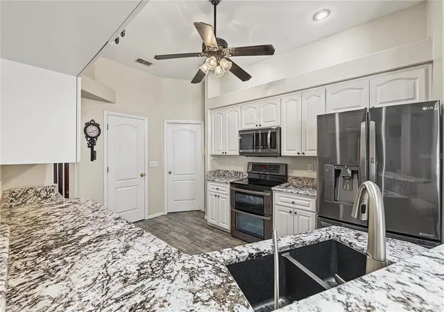 Photo 3 of Single family home for sale at 24415 Rolling View Ct, Wesley Chapel, FL 33559 | MLS# TB8553878 | Listing updated on 2026-10-06