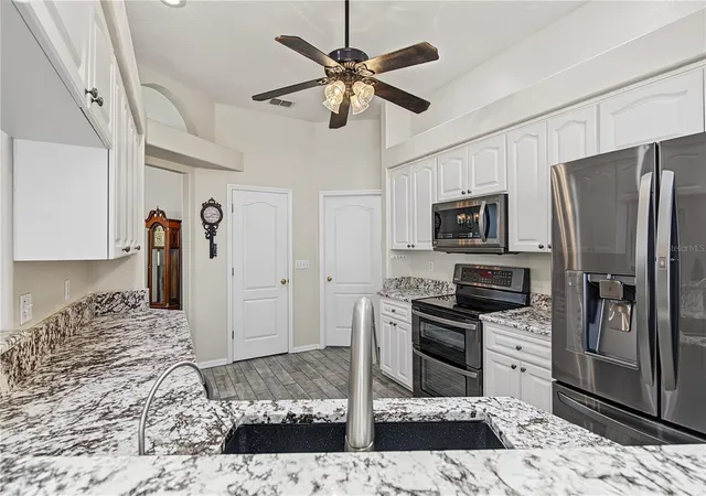 Photo 4 of Single family home for sale at 24415 Rolling View Ct, Wesley Chapel, FL 33559 | MLS# TB8553878 | Listing updated on 2026-10-06