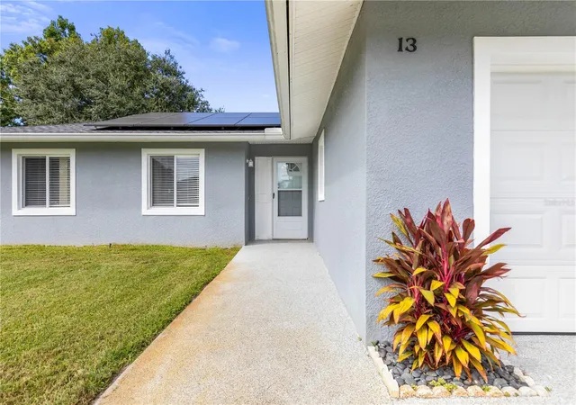 Photo 2 of Single family home for sale at 13 Belleaire Dr, Palm Coast, FL 32137 | MLS# FC321827 | Listing updated on 2026-10-06