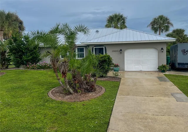 Photo 1 of Single family home for sale at 18663 Macgill Ave, Port Charlotte, FL 33948 | MLS# O6446406 | Listing updated on 2026-10-02