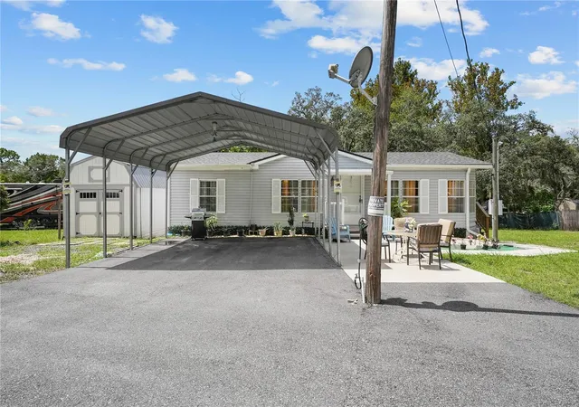 Photo 1 of Manufactured home for sale at 9918 Osceola Dr, Weeki Wachee, FL 34613 | MLS# TB8553918 | Listing updated on 2026-10-01