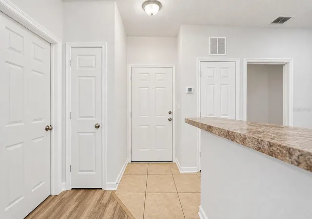 Listing Photo 5 - Condo for sale in building located at 10209 Courtney Palms Blvd, Tampa, FL 33619 - Unit #301