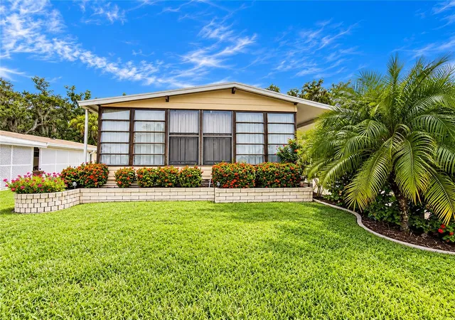 Photo 1 of Manufactured home for sale at 15 Meadowlark Cir, Ellenton, FL 34222 | MLS# A4708107 | Listing updated on 2026-10-10