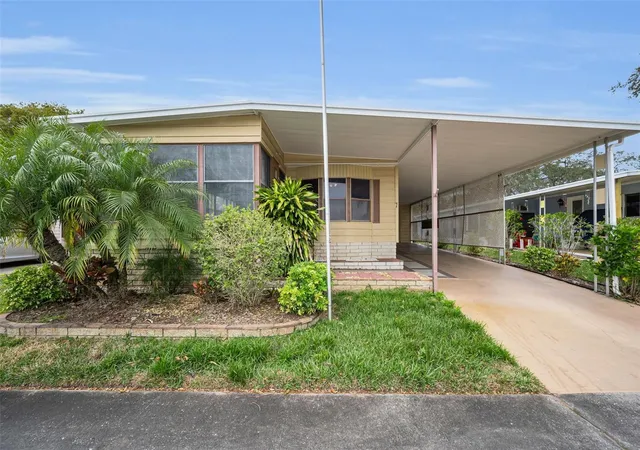 Photo 1 of Manufactured home for sale at 7 Mountain Laurel Dr, Palm Harbor, FL 34684 | MLS# TB8553943 | Listing updated on 2026-10-02
