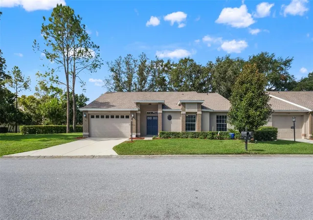 Photo 1 of Single family home for sale at 1385 Summerwood Ct, Spring Hill, FL 34606 | MLS# W7889995 | Listing updated on 2026-10-02