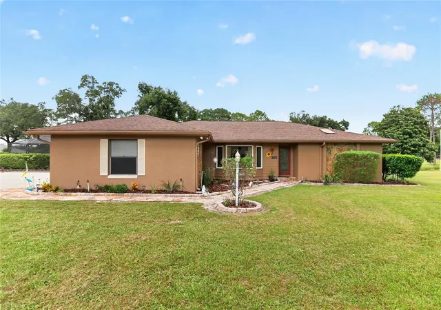 Photo 1 of Single family home for sale at 205 E Falconry Ct, Hernando, FL 34442 | MLS# OM733250 | Listing updated on 2026-10-03