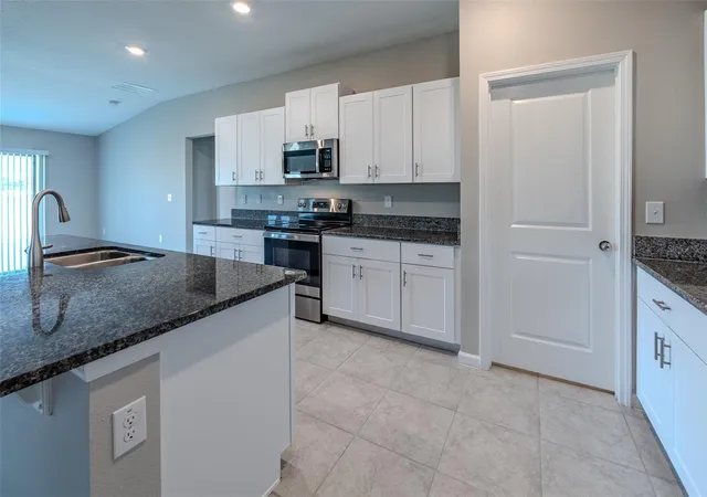 Photo 3 of Single family home for sale at 5699 SW 92nd Place, Ocala, FL 34476 | MLS# OM733256 | Listing updated on 2026-10-06