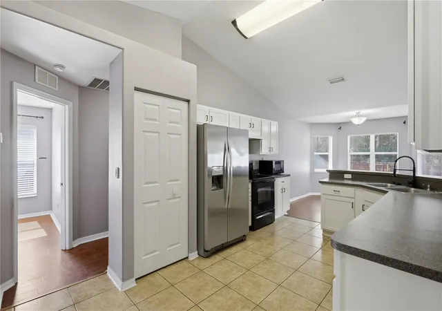 Photo 4 of Single family home for sale at 90 Zephyr Lily Trl, Palm Coast, FL 32164 | MLS# FC321840 | Listing updated on 2026-10-15