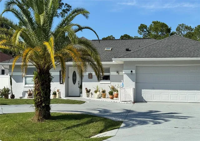 Photo 1 of Single family home for sale at 8 Whippoorwill Dr, Palm Coast, FL 32164 | MLS# FC321845 | Listing updated on 2026-10-20