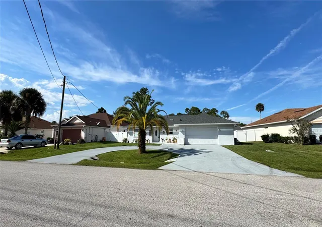Photo 3 of Single family home for sale at 8 Whippoorwill Dr, Palm Coast, FL 32164 | MLS# FC321845 | Listing updated on 2026-10-20