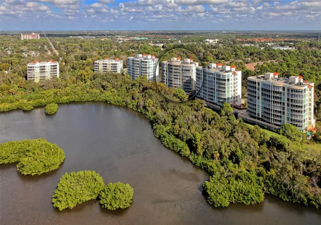 Photo 1 of Condo for sale at 401 N Point Rd #404, Osprey, FL 34229 | MLS# A4708169 | Listing updated on 2026-10-06