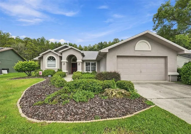 Photo 1 of Single family home for sale at 8657 Cypress Lakes Blvd, New Port Richey, FL 34653 | MLS# A4708172 | Listing updated on 2026-10-10
