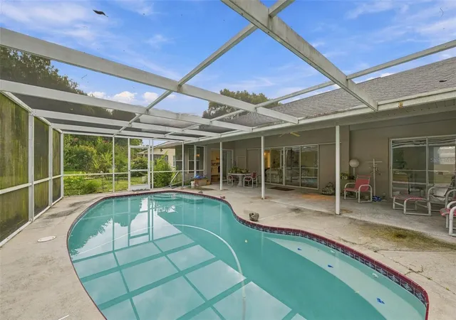 Photo 2 of Single family home for sale at 8657 Cypress Lakes Blvd, New Port Richey, FL 34653 | MLS# A4708172 | Listing updated on 2026-10-10