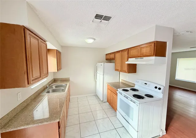 Photo 2 of Single family home for sale at 661 Gulliver Ave, Deltona, FL 32738 | MLS# O6446570 | Listing updated on 2026-10-08