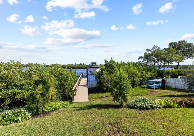 Photo 4 of Single family home for sale at 1512 Riverside Dr, Tarpon Springs, FL 34689 | MLS# TB8554114 | Listing updated on 2026-10-04