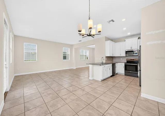 Photo 3 of Townhouse for sale at 4911 Tribute Trl, Kissimmee, FL 34746 | MLS# O6446579 | Listing updated on 2026-10-08