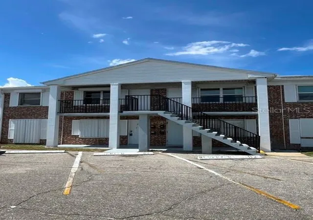 Photo 1 of Condo for sale at 190 E Olmstead Dr #F32, Titusville, FL 32780 | MLS# C7531466 | Listing updated on 2026-10-03