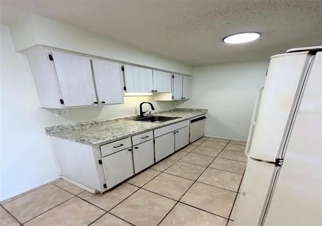 Photo 4 of Condo for sale at 190 E Olmstead Dr #F32, Titusville, FL 32780 | MLS# C7531466 | Listing updated on 2026-10-03