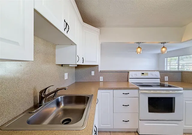 Photo 3 of Condo for sale at 11921 Boynton Ln #53A, New Port Richey, FL 34654 | MLS# W7890007 | Listing updated on 2026-10-08