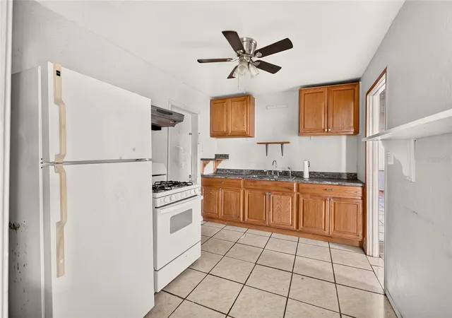 Photo 3 of Single family home for sale at 907 NE 24th Street, Gainesville, FL 32641 | MLS# GC543919 | Listing updated on 2026-10-06