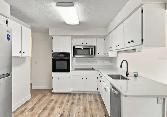 Photo 3 of Single family home for sale at 13823 Wildwood Dr, Largo, FL 33774 | MLS# TB8554140 | Listing updated on 2026-10-06