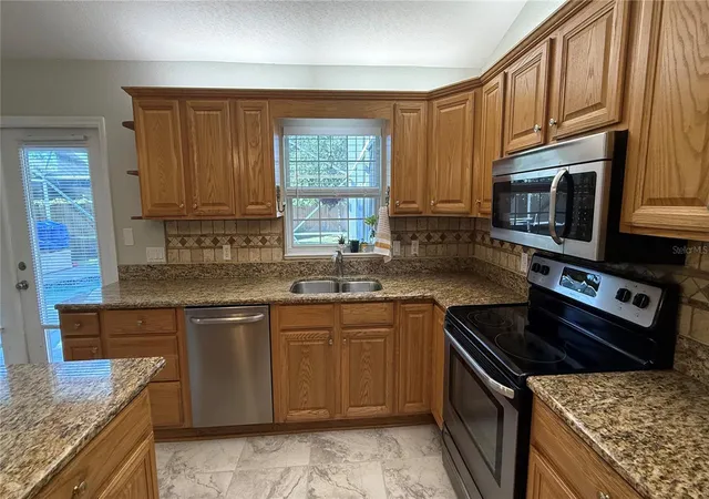 Photo 3 of Single family home for sale at 3974 SE 24th Court, Ocala, FL 34480 | MLS# OM733298 | Listing updated on 2026-10-05