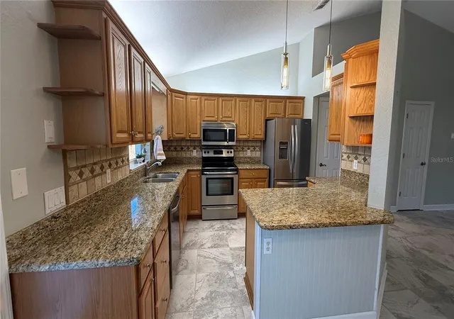 Photo 4 of Single family home for sale at 3974 SE 24th Court, Ocala, FL 34480 | MLS# OM733298 | Listing updated on 2026-10-05