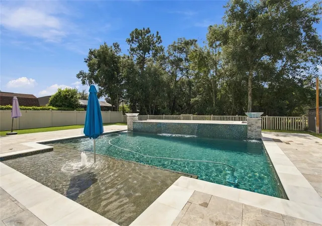 Photo 2 of Single family home for sale at 13856 Crst Lake Dr, Hudson, FL 34669 | MLS# TB8554145 | Listing updated on 2026-10-03