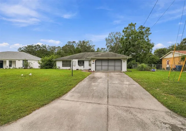 Photo 1 of Single family home for sale at 7422 Balsam St, Spring Hill, FL 34606 | MLS# W7890009 | Listing updated on 2026-10-04