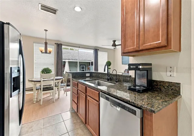 Photo 4 of Townhouse for sale at 10645 Marsha Dr, New Port Richey, FL 34655 | MLS# W7890011 | Listing updated on 2026-10-07