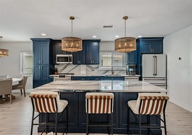 Photo 4 of Single family home for sale at 11425 5th Street E, Treasure Island, FL 33706 | MLS# TB8554181 | Listing updated on 2026-10-02