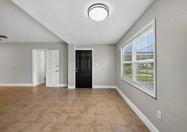 Photo 3 of Single family home for sale at 725 Strain Blvd, Lakeland, FL 33815 | MLS# TB8554185 | Listing updated on 2026-10-02