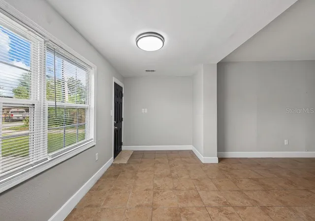 Photo 3 of Single family home for sale at 725 Strain Blvd, Lakeland, FL 33815 | MLS# TB8554185 | Listing updated on 2026-10-02