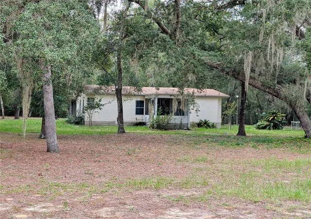 Photo 1 of Manufactured home for sale at 12180 Ne 238th Terrace, Fort Mc Coy, FL 32134 | MLS# OM733311 | Listing updated on 2026-10-08