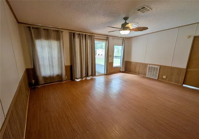 Photo 3 of Manufactured home for sale at 12180 Ne 238th Terrace, Fort Mc Coy, FL 32134 | MLS# OM733311 | Listing updated on 2026-10-08