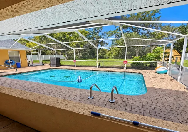 Photo 3 of Single family home for sale at 13285 Cecil Ct, Spring Hill, FL 34609 | MLS# W7890016 | Listing updated on 2026-10-03