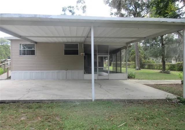 Photo 2 of Manufactured home for sale at 1742 Se 169th Terrace Rd, Silver Springs, FL 34488 | MLS# OM733314 | Listing updated on 2026-10-09