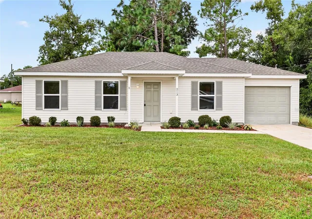 Photo 1 of Single family home for sale at 213 Oak Ln, Ocala, FL 34472 | MLS# OM733324 | Listing updated on 2026-10-08