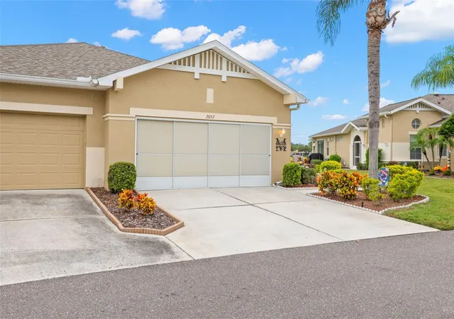 Photo 3 of Condo for sale at 2057 Inverness Greens Dr, Sun City Center, FL 33573 | MLS# TB8554271 | Listing updated on 2026-10-09