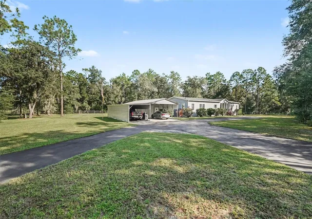 Photo 4 of Manufactured home for sale at 4943 E Stage Coach Trl, Floral City, FL 34436 | MLS# TB8554272 | Listing updated on 2026-10-03