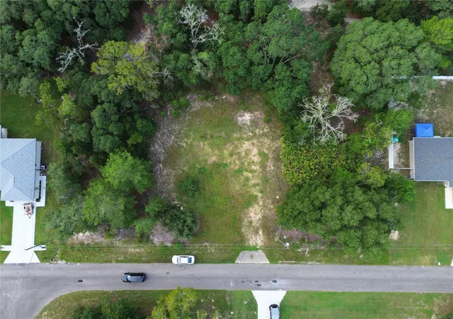 Photo 2 of Land for sale at 106 Guava Pass, Ocklawaha, FL 32179 | MLS# OM733335 | Listing updated on 2026-10-02