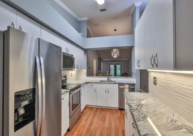 Photo 3 of Single family home for sale at 3012 Oak Hammock Dr, Port Orange, FL 32129 | MLS# O6446710 | Listing updated on 2026-10-03