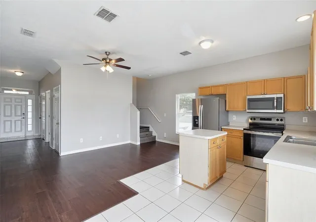 Photo 3 of Townhouse for sale at 7041 Opal Dr, Largo, FL 33773 | MLS# O6446741 | Listing updated on 2026-10-09