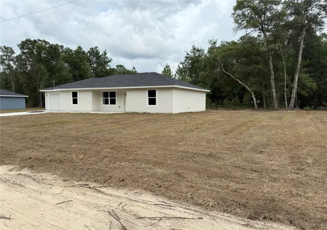 Photo 1 of Single family home for sale at 1323 NW 52nd Court, Ocala, FL 34482 | MLS# OM733342 | Listing updated on 2026-10-04
