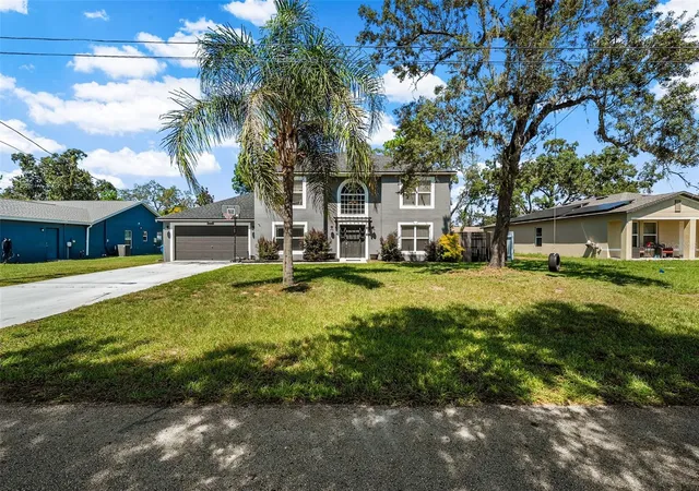 Photo 3 of Single family home for sale at 8295 Begonia St, Spring Hill, FL 34608 | MLS# TB8554326 | Listing updated on 2026-10-03