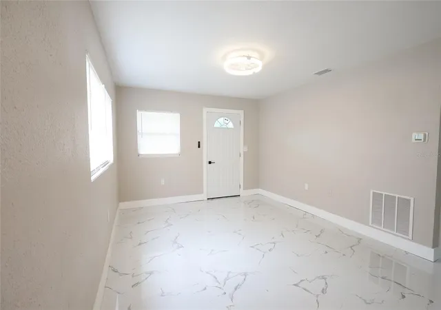 Photo 4 of Single family home for sale at 1328 E Parker St, Lakeland, FL 33801 | MLS# TB8554333 | Listing updated on 2026-10-03