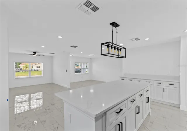 Photo 3 of Single family home for sale at 4410 Chateau Rd, Orlando, FL 32808 | MLS# O6446759 | Listing updated on 2026-10-03